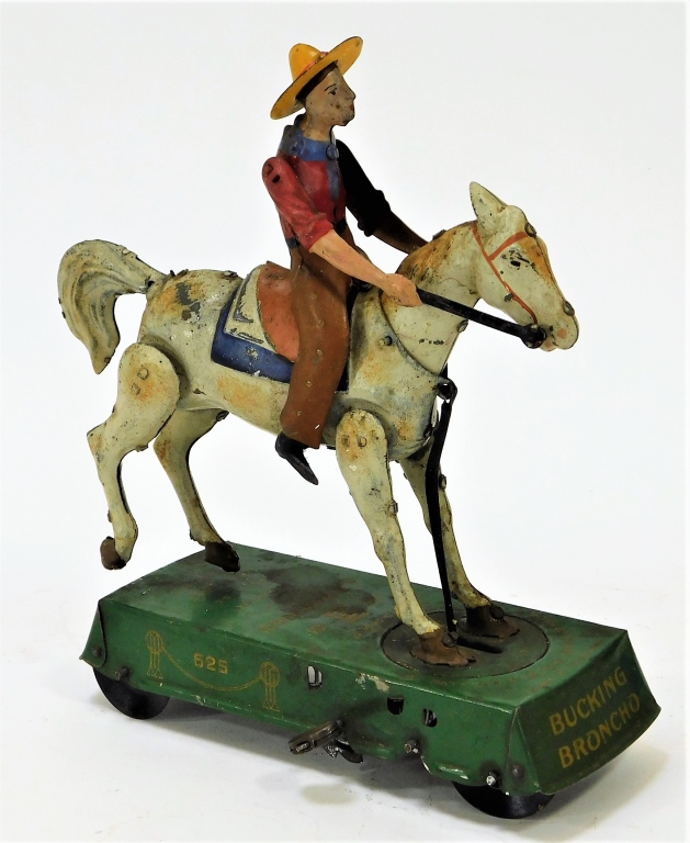 Appraisal: ANTIQUE LEHMANN BUCKING BRONCO WIND UP TIN TOY Germany Early