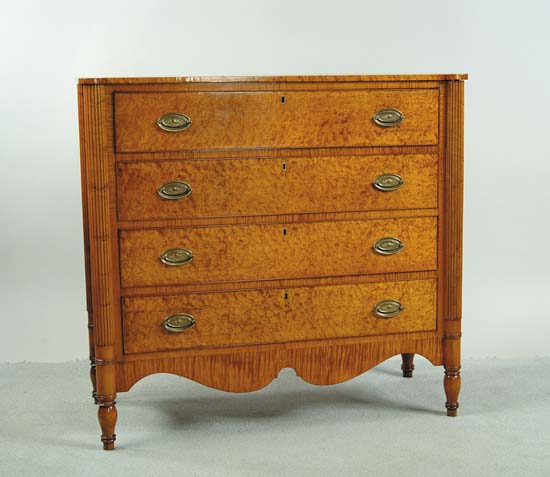 Appraisal: OUTSTANDING FOUR DRAWER BIRDSEYE MAPLE SHERATON CHEST Shaped top having