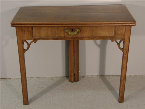 Appraisal: George III mahogany folding tea table with a single drawer