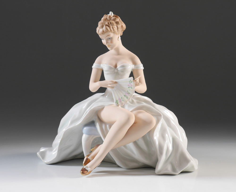 Appraisal: SCHAUBACH-KUNST WALLENDORF PORCELAIN FIGURE Seated Woman with fan mark dates