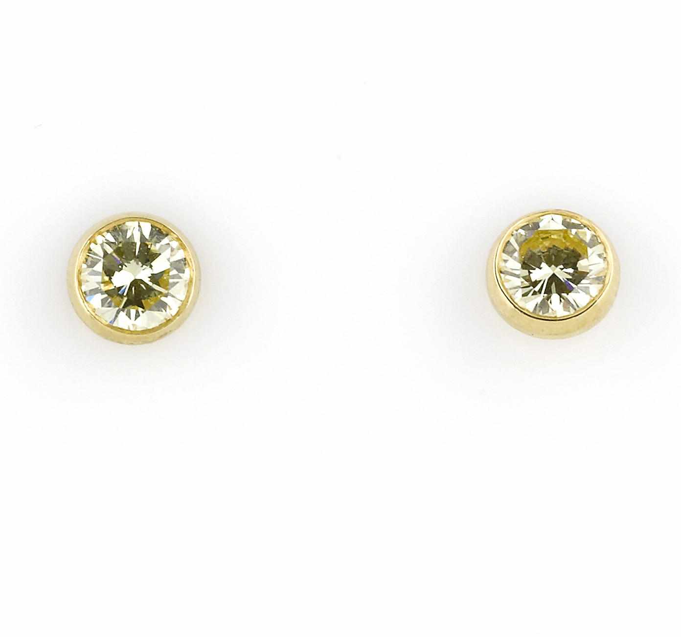 Appraisal: A pair of colored diamond solitaire earrings each bezel-set round