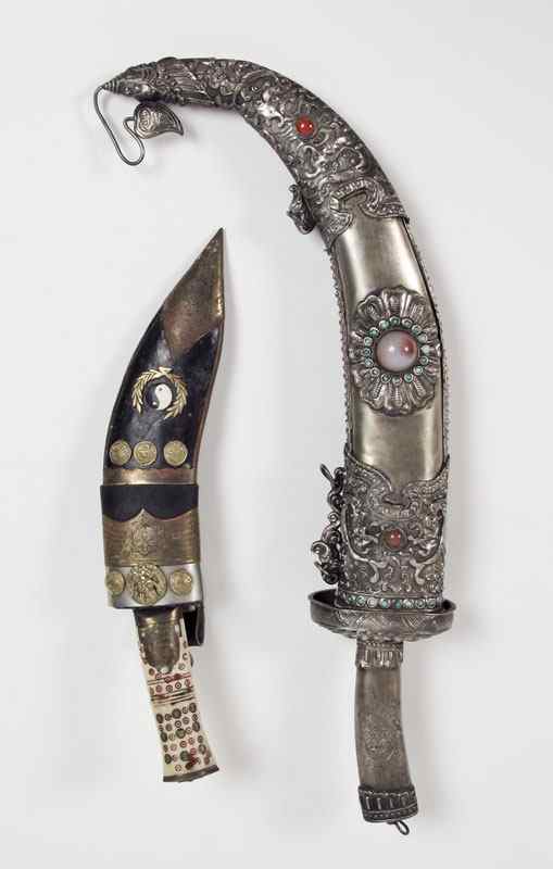 Appraisal: PIECE DECORATIVE TIBETAN DAGGERS To include Large metal mounted dagger