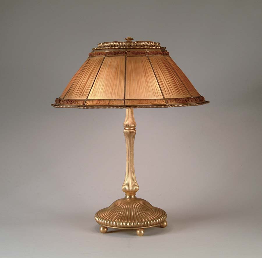 Appraisal: TIFFANY LINENFOLD TABLE LAMP Wonderful amber linenfold shade has heavy