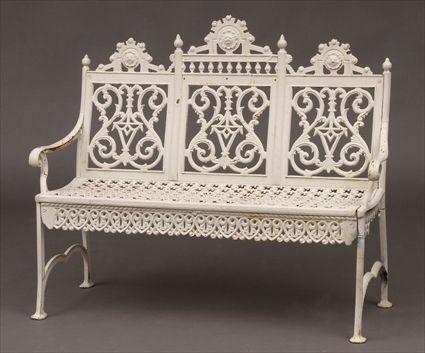 Appraisal: AMERICAN WHITE-PAINTED CAST-IRON GARDEN BENCH The back pierced with urn