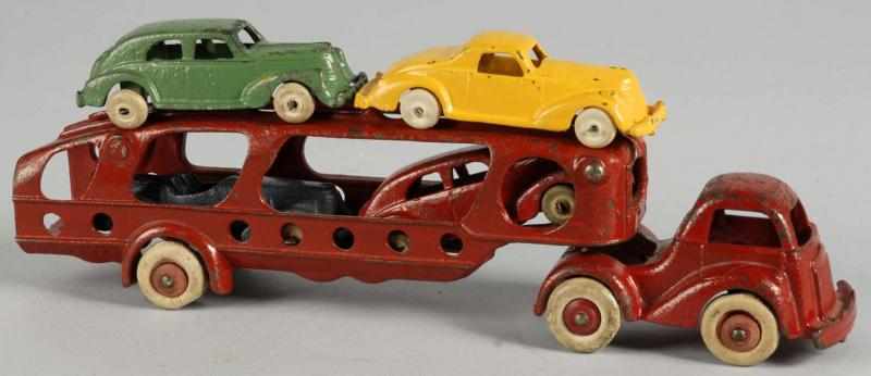 Appraisal: Cast Iron Arcade Car Carrier Toy Description American Includes four