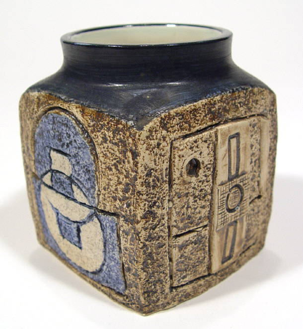 Appraisal: Troika preserve pot with incised and painted abstract decoration marked