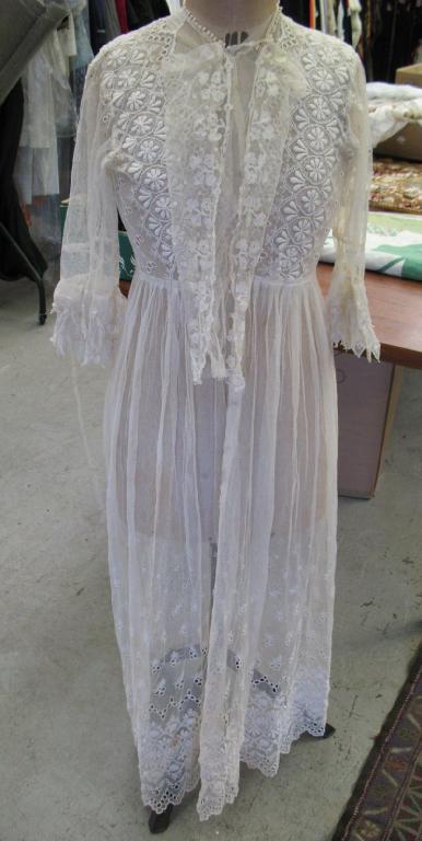 Appraisal: A Victorian lace dress with three quarter length sleeves