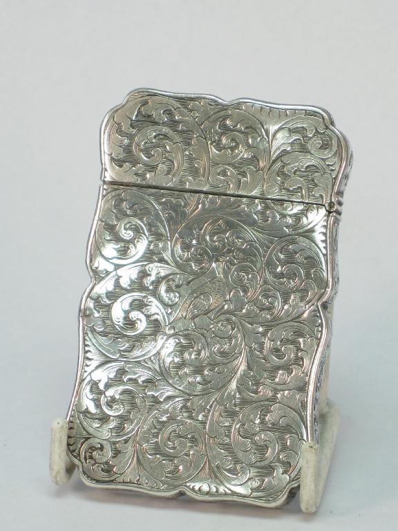 Appraisal: A Victorian Card case with bird and leafage scroll engraving