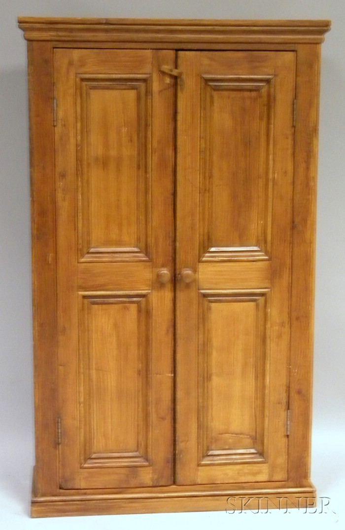 Appraisal: Stained Pine Paneled Double-Door Cupboard the interior with two fixed