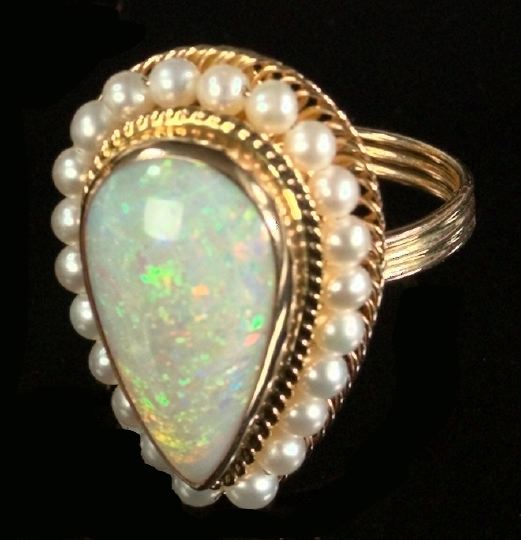 Appraisal: Fourteen-Karat Yellow Gold Opal and Pearl Dinner Ring featuring a