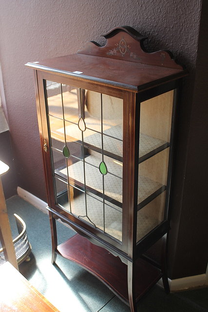 Appraisal: AN ART NOUVEAU SMALL DISPLAY CABINET with leaded glass door