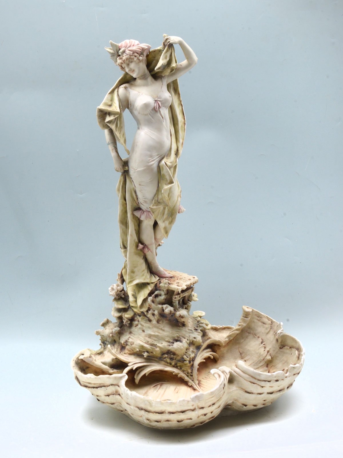 Appraisal: EROTIC FIGURAL TEPLITZ PORCELAIN CENTERPIECE Semi-nude bathing beauty standing on