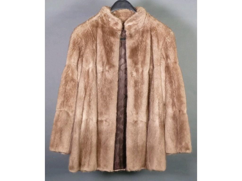 Appraisal: MUSQUASH FLANK LIGHT BROWN THREE QUARTER LENGTH FUR COAT WITH