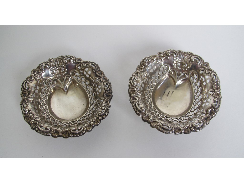 Appraisal: A pair of Edwardian silver bon bon dishes with embossed