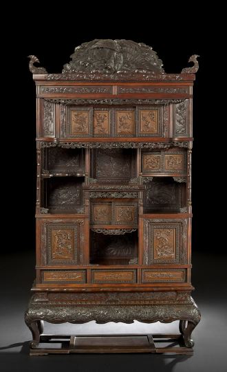 Appraisal: Elaborate Japanese Carved Wood Display Cabinet ca the cabinet in