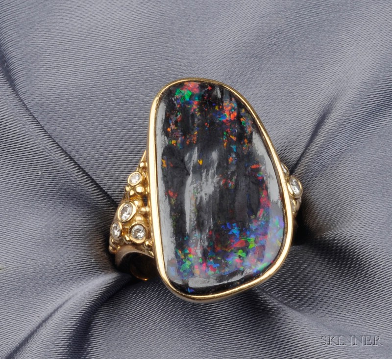 Appraisal: kt Gold Boulder Opal and Diamond Ring centering a bezel-set