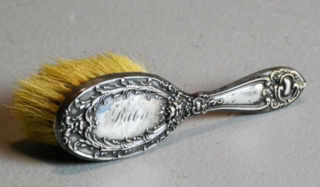 Appraisal: A Childs Sterling And Horsehair BrushDecorated with c scroll and