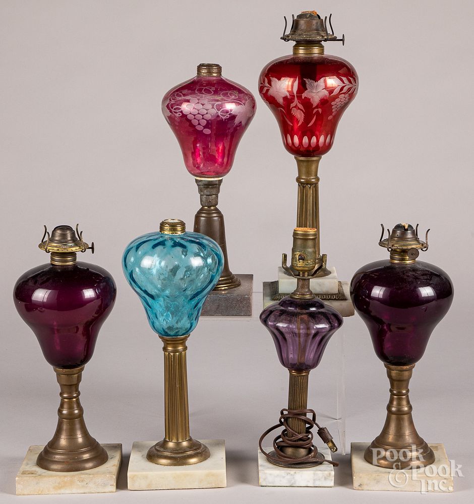 Appraisal: Six colored glass fluid lamps Six colored glass fluid lamps