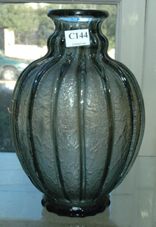 Appraisal: A DAUM NANCY GLASS VASE Ovoid ribbed with a flared