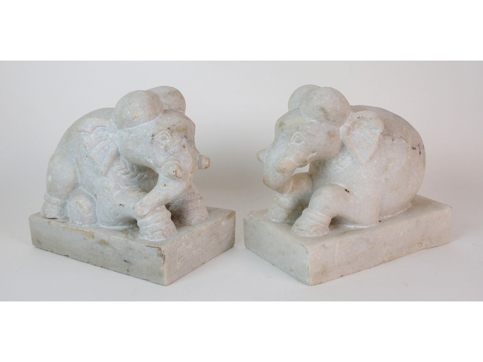 Appraisal: A pair of Indian elephant hardstone modelseach recumbent on a