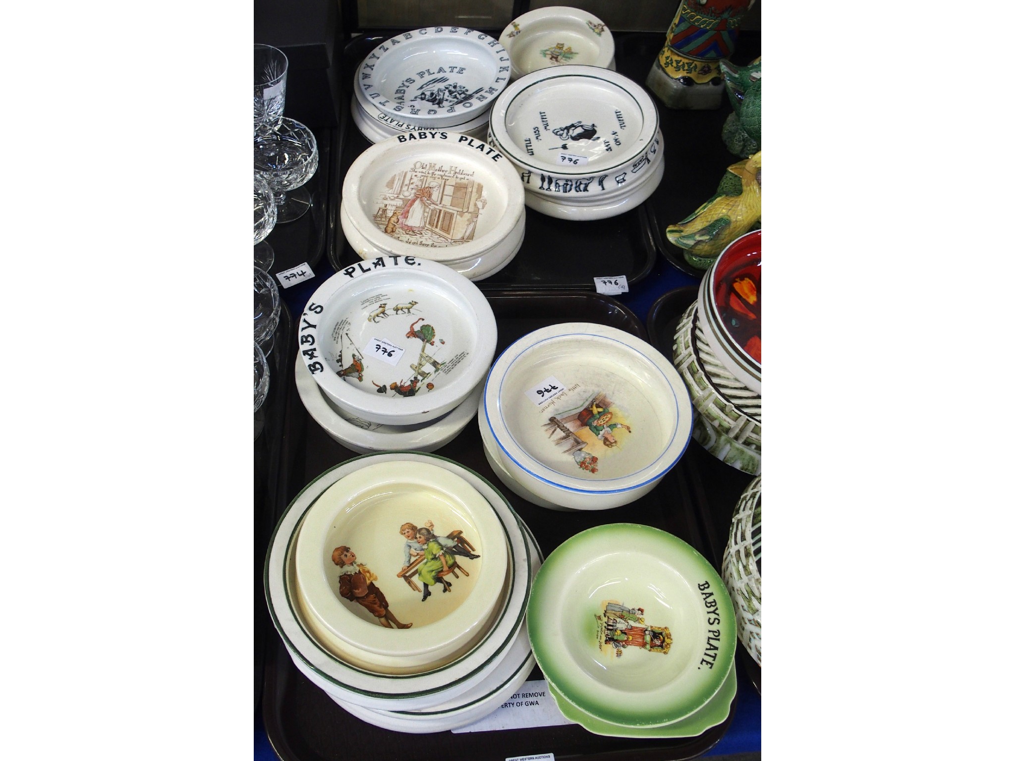 Appraisal: Two trays comprising various children's nursery ware dinner bowls and