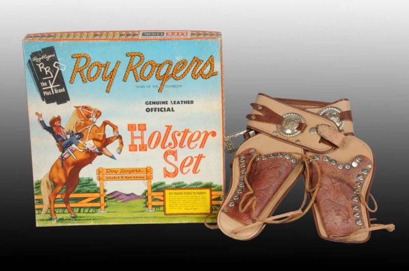 Appraisal: Roy Rogers Toy Holster Set Description Includes original box featuring