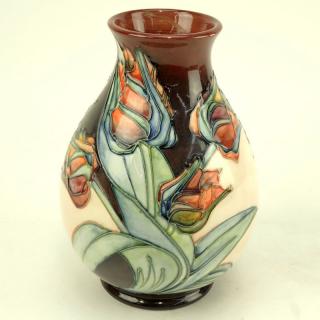 Appraisal: Moorcroft Pottery Vase Moorcroft Pottery Vase Tulip motif Signed Light