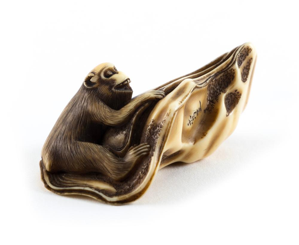 Appraisal: JAPANESE CARVED IVORY NETSUKE BY HIDEMASA MID- TH CENTURY LENGTH