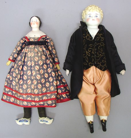 Appraisal: Pair of china head dolls Female - 's style black