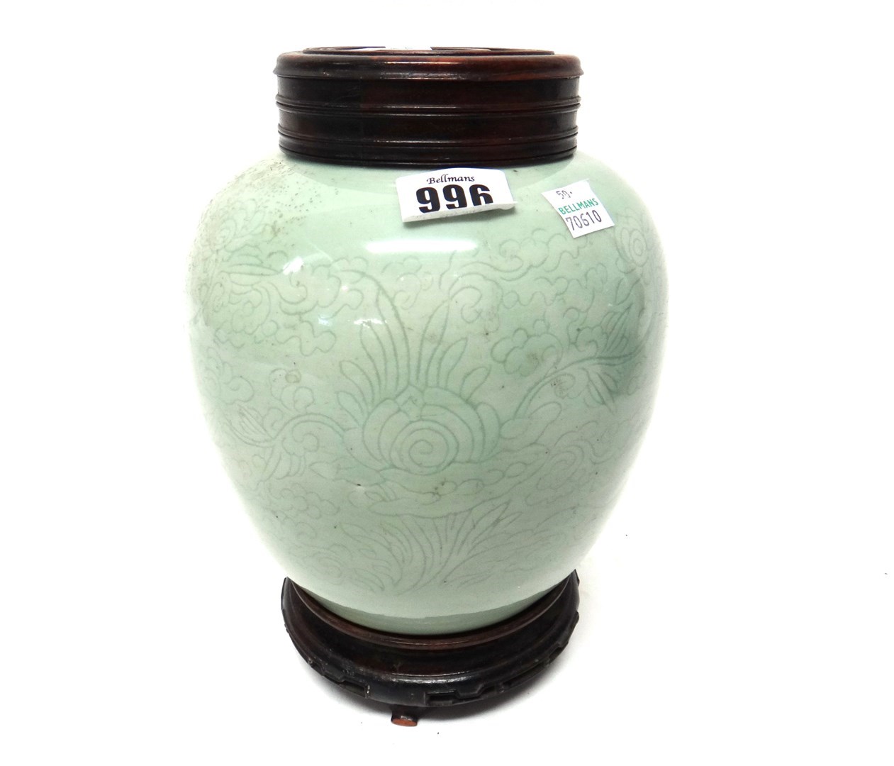 Appraisal: A Chinese celadon ground porcelain ovoid jar th century incised