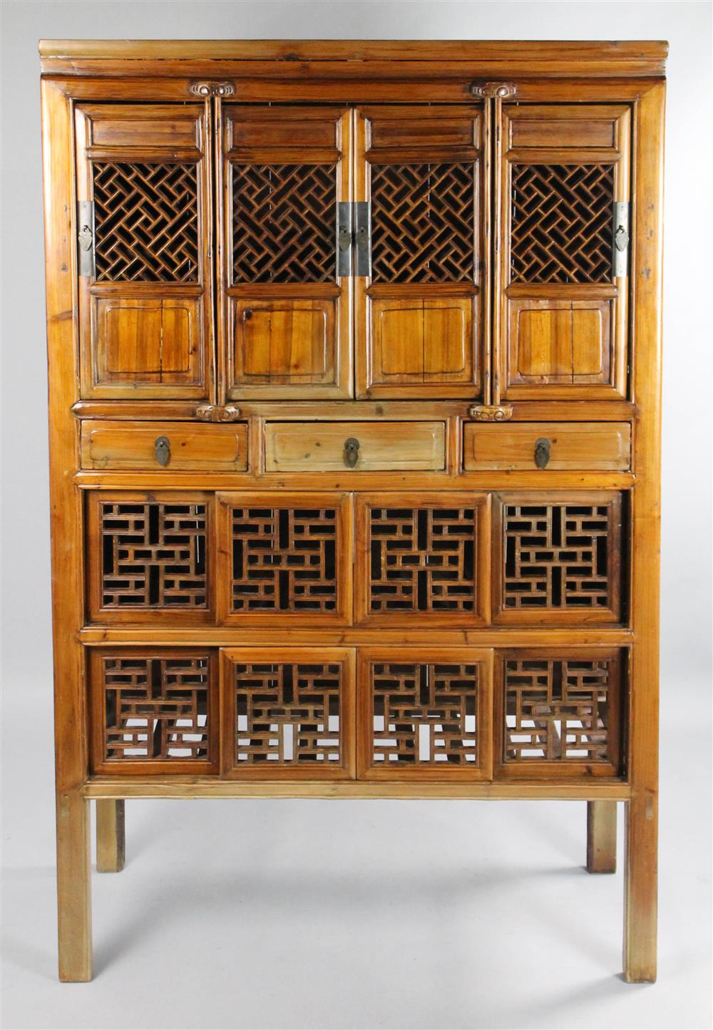 Appraisal: CHINESE TH CENTURY HARDWOOD KITCHEN CABINET four lattice hinged doors