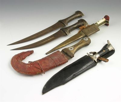 Appraisal: Two Persian steel and parcel gilt hunting daggers with fullered