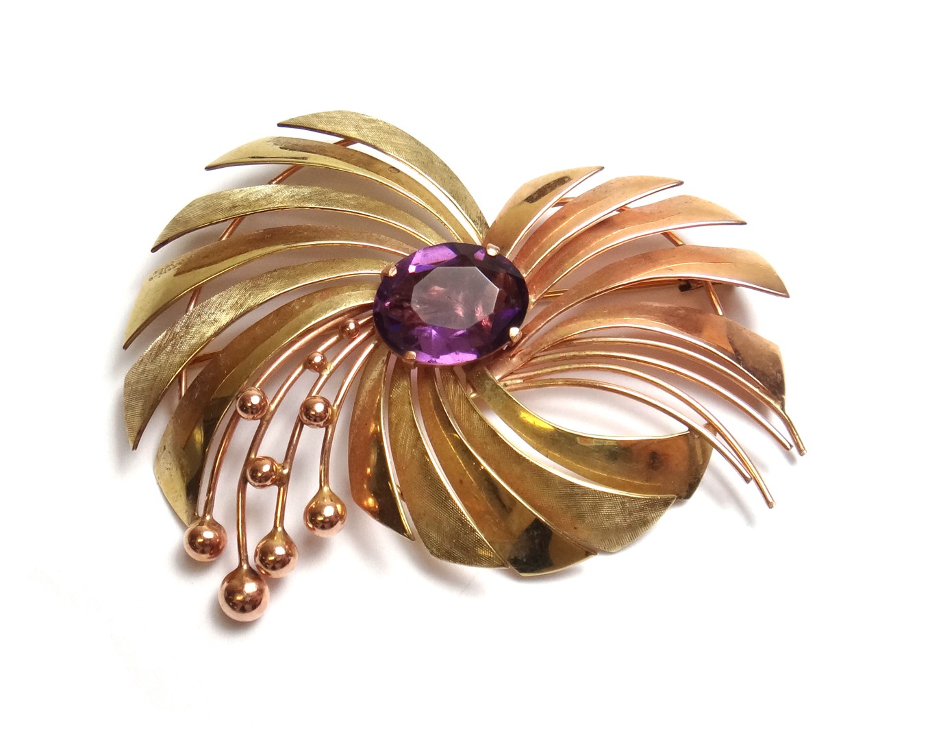 Appraisal: A two colour gold and mauve paste set brooch in