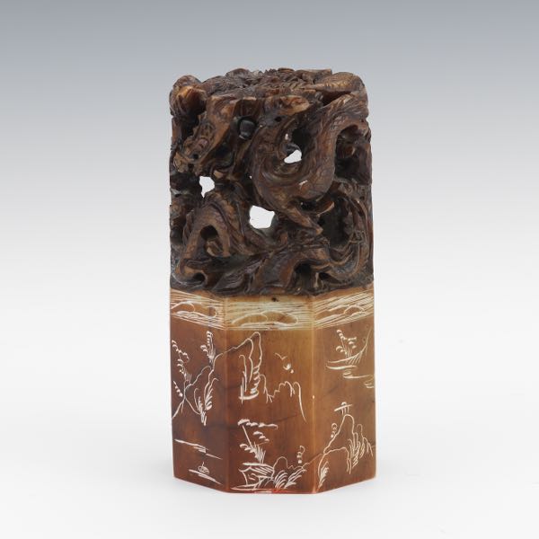 Appraisal: CHINESE CARVED HARDSTONE DRAGON SEAL x x Octagonal russet brown-yellow