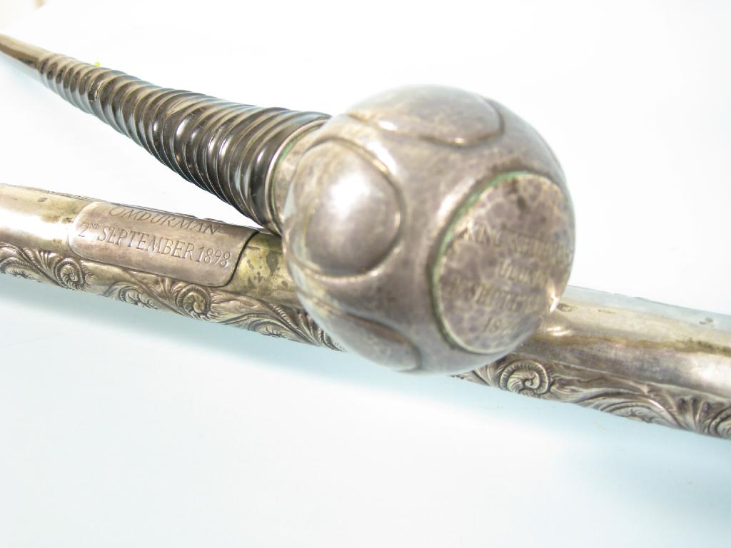 Appraisal: An antler Walking Stick the round hammered white metal handle