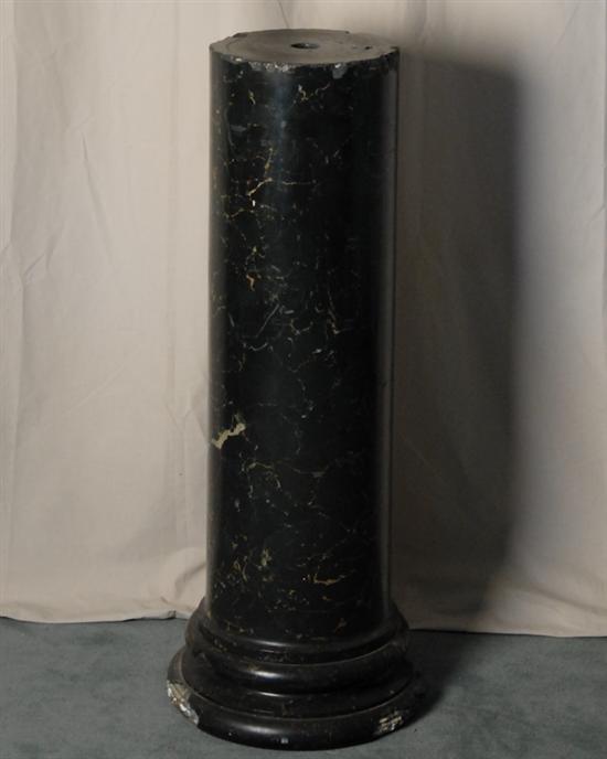 Appraisal: A Marble Cylindrical Pedestal round stepped ring base black marble