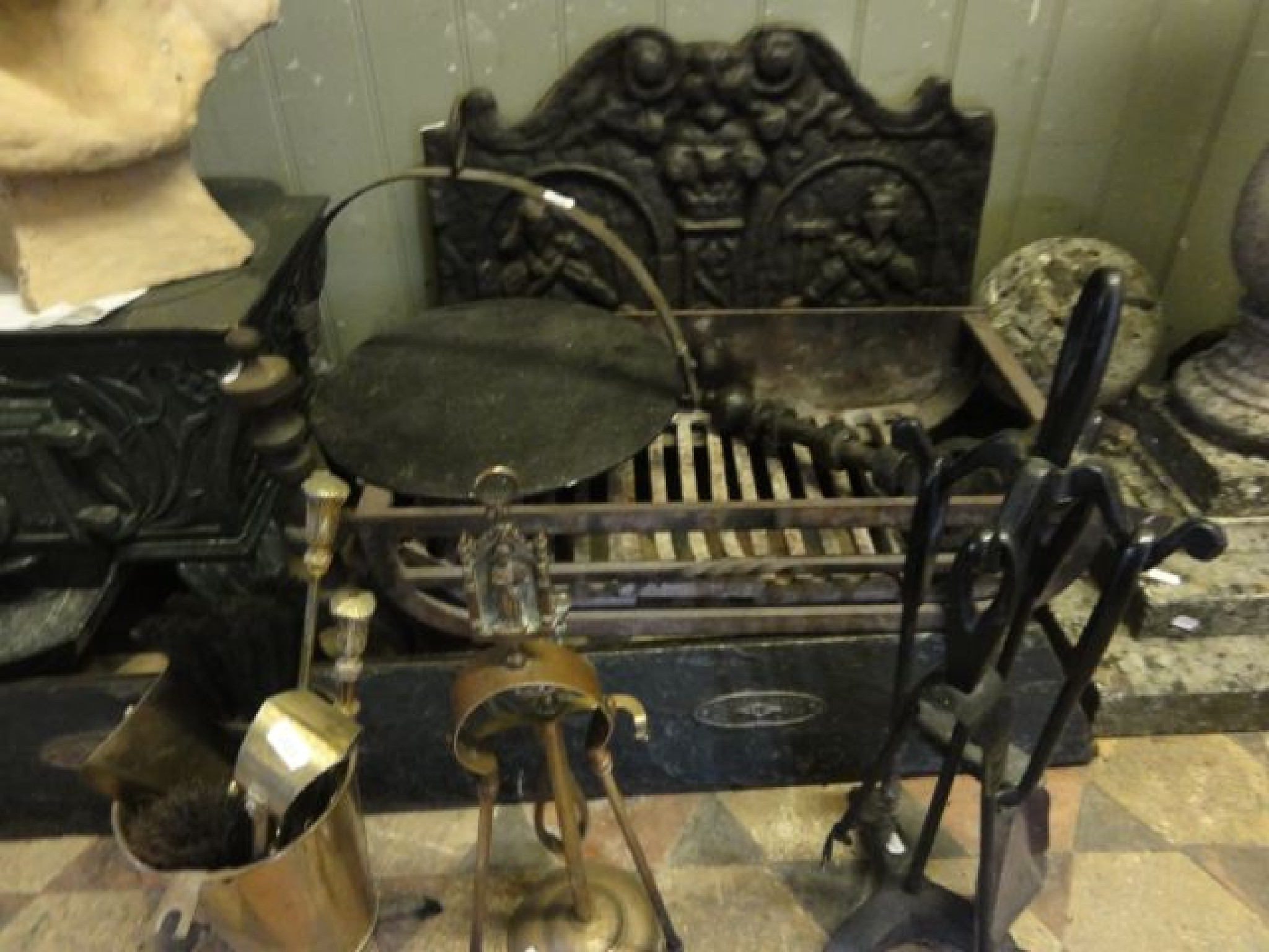 Appraisal: A heavy old English style cast iron fire back with