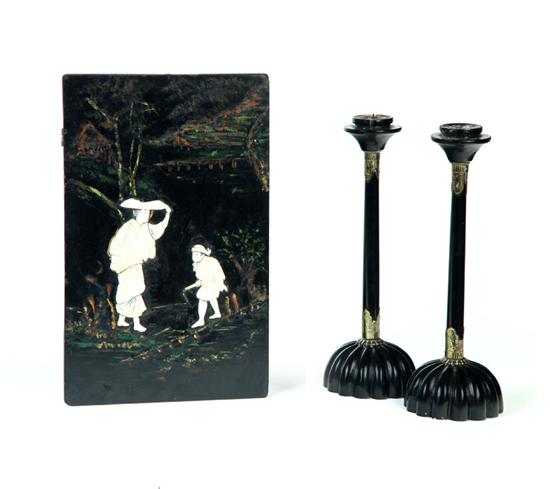 Appraisal: GROUP ASIAN PLAQUE AND PAIR OF CANDLESTICKS Black candlesticks with