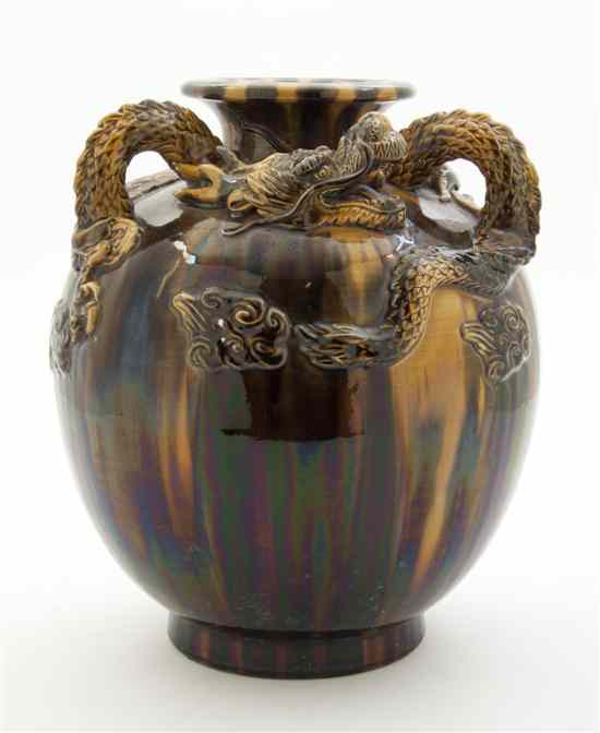 Appraisal: An English Ceramic Vase of ovoid form with applied dragon