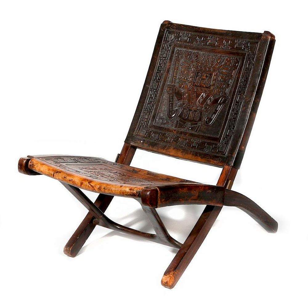 Appraisal: Peruvian wood and leather chair c first half th century