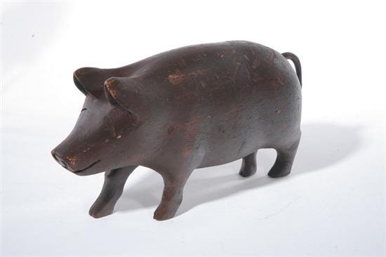 Appraisal: FOLK ART CARVING OF A PIG American early th century