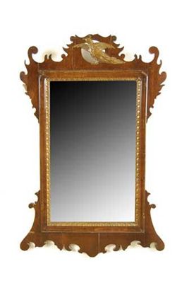 Appraisal: A mahogany fret-frame mirror in George III style x in