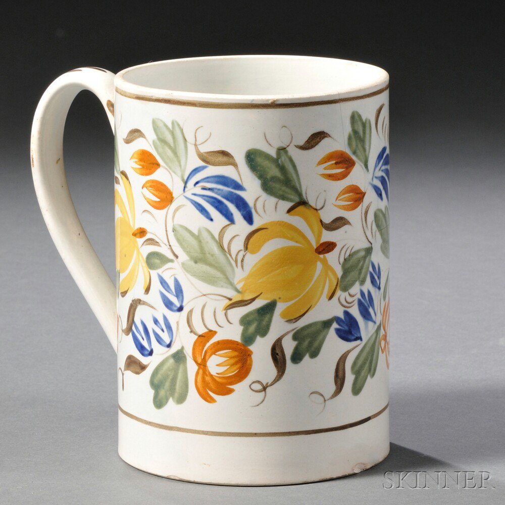 Appraisal: Floral-decorated Pearlware Mug England early th century quart mug decorated