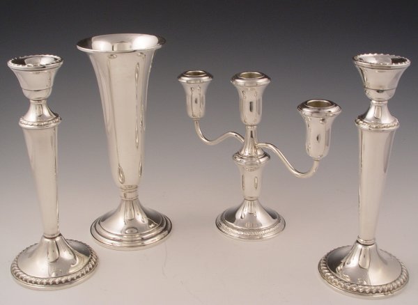 Appraisal: PIECE ESTATE STERLING LOT TRUMPET VASE CANDLESTICKS To include Gorham