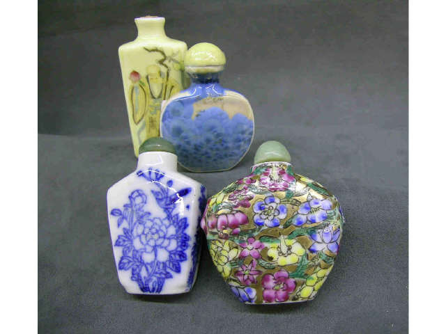 Appraisal: Four antique oriental decorated porcelain snuff bottles two signed