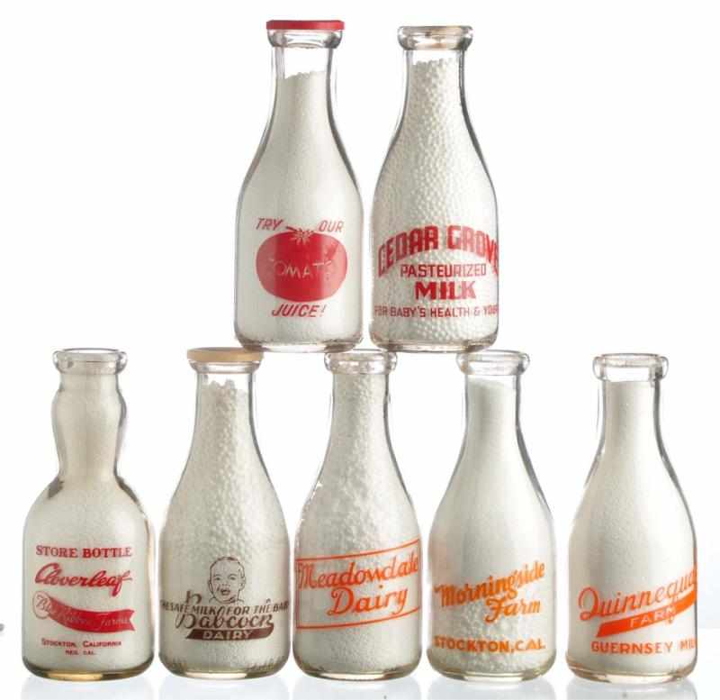 Appraisal: Lot of Milk Bottles from Various Locations Description Lot includes