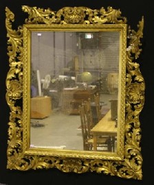 Appraisal: A Victorian carved giltwood wall mirror damaged cm x cm