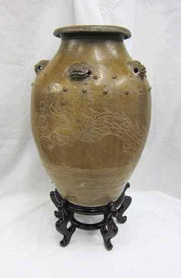 Appraisal: POTTERY RICE WINE JAR Chinese th century of standard round