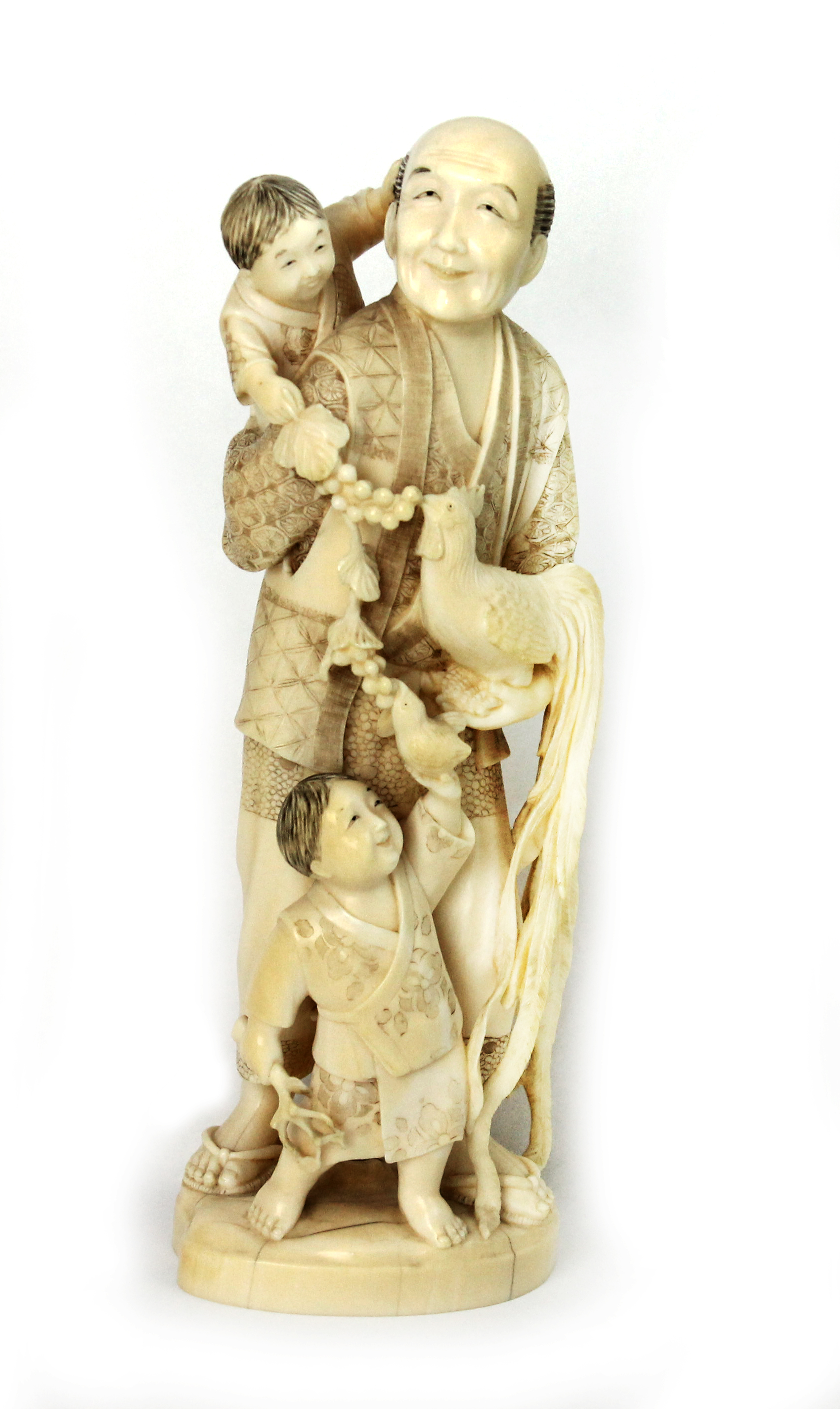 Appraisal: A Japanese ivory okimono of a man Meiji period standing