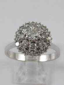 Appraisal: A white metal tests carat gold diamond cluster ring the